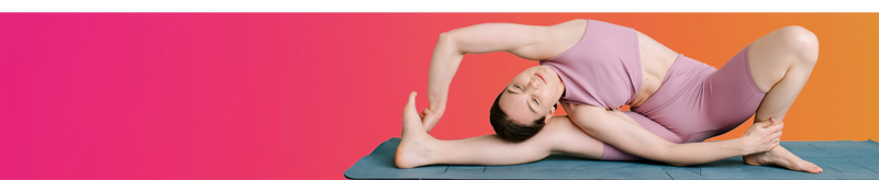 person stretching on a yoga mat